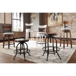 Tall Valebeck Upholstered Swivel Barstool - Signature Design By Ashley 15 Tall Valebeck Upholstered Swivel Barstool - Signature Design By Ashley -Furniture Store GUEST 5972e2ca f293 421c 837d 139bbf5599cd