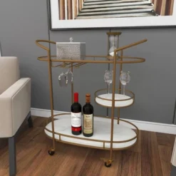 Contemporary Iron Bar Cart Gold - Olivia & May 27 Contemporary Iron Bar Cart Gold - Olivia & May -Furniture Store GUEST 658c9490 a564 4a2c 9f35 38dbf5f4a56a